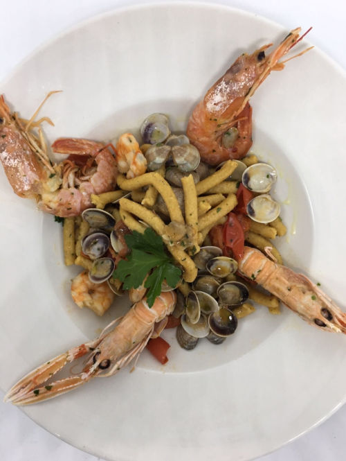 Passatelli romagnoli asciutti con vongole, crostacei e pomodorini Passatelli romagnoli asciutti con vongole, crostacei e pomodorini